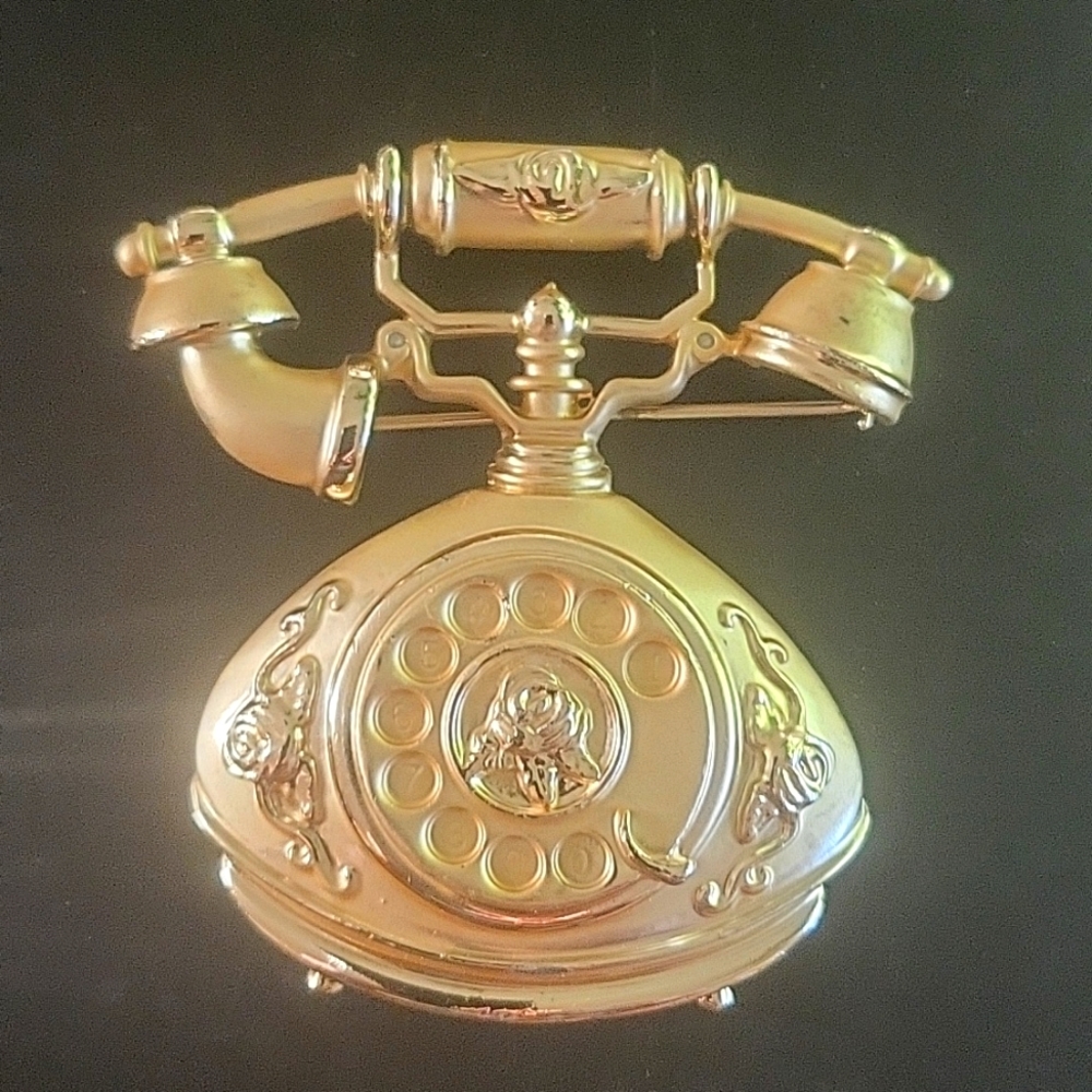 Telephone brooch
